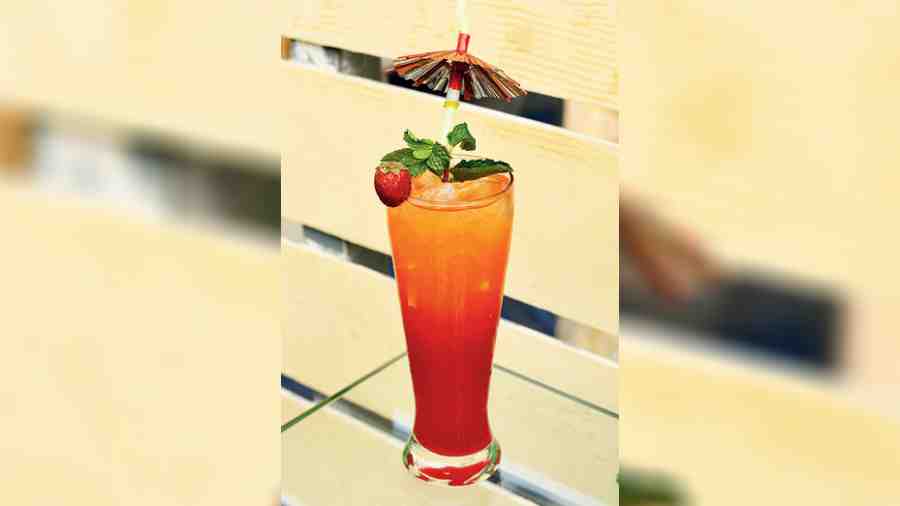 Alexander De Great is a strawberry and apple based mocktail topped with orange juice. A refreshing sip, we say.