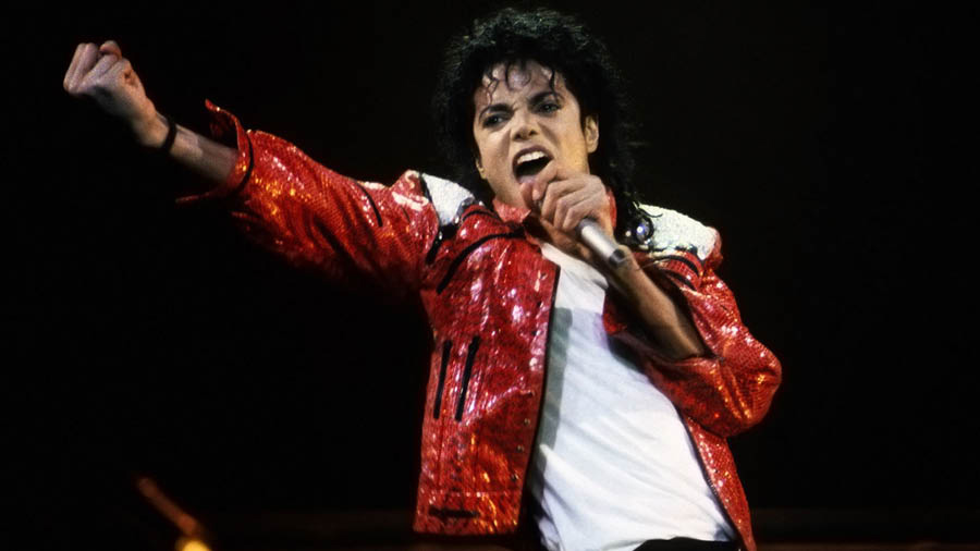 Michael Jackson performing at a concert.