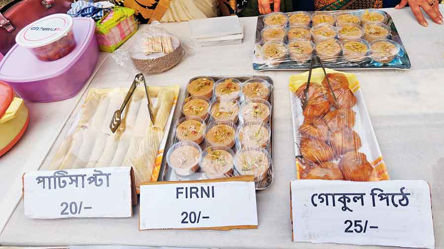 A range of traditional desserts on offer at the Pithe Puli Utsav in CE Block in New Town. 