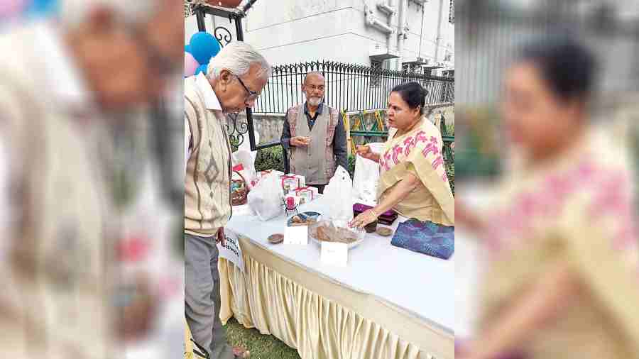 A resident checks out the sweetmeats at one of the stalls in CE Block. 