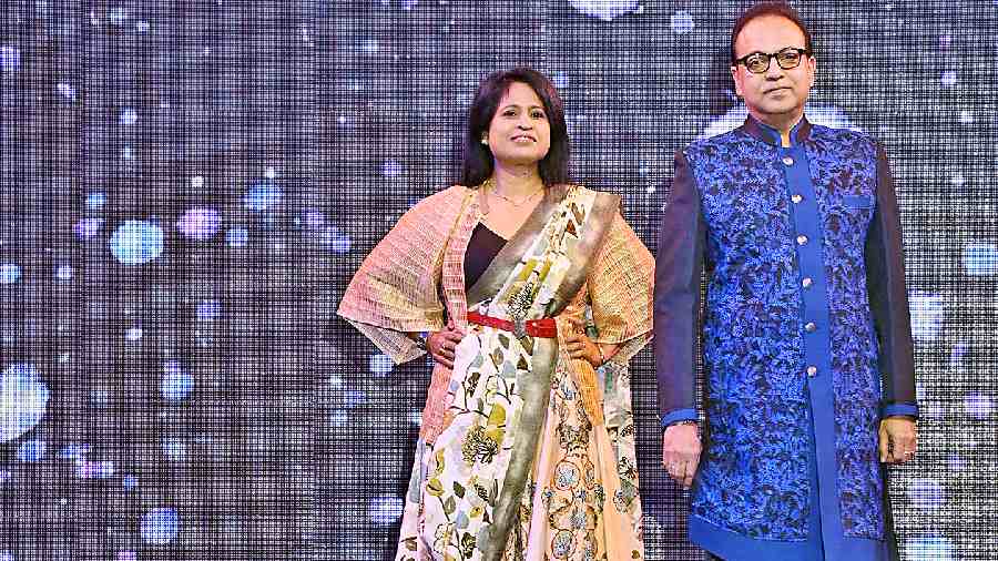 Arindam Sil sported a threadwork achkan and Shukla complemented the frame in a handwoven digital-printed silk sari, teamed with a laser-cut shrug and a custom leather belt