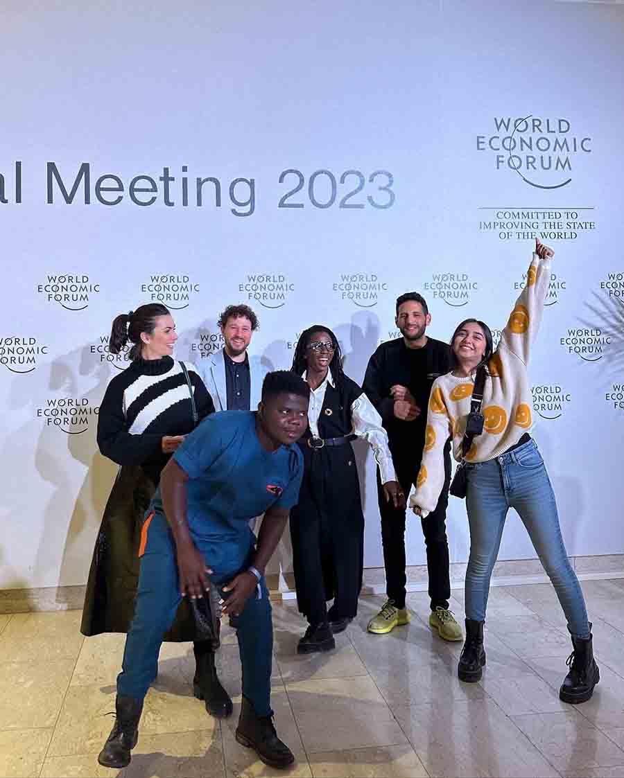 Prajakta posed with fellow YouTubers from other parts of the world at the World Economic Forum annual meeting, 2023. She wore blue denims and a pumpkin motif top at the meeting.
