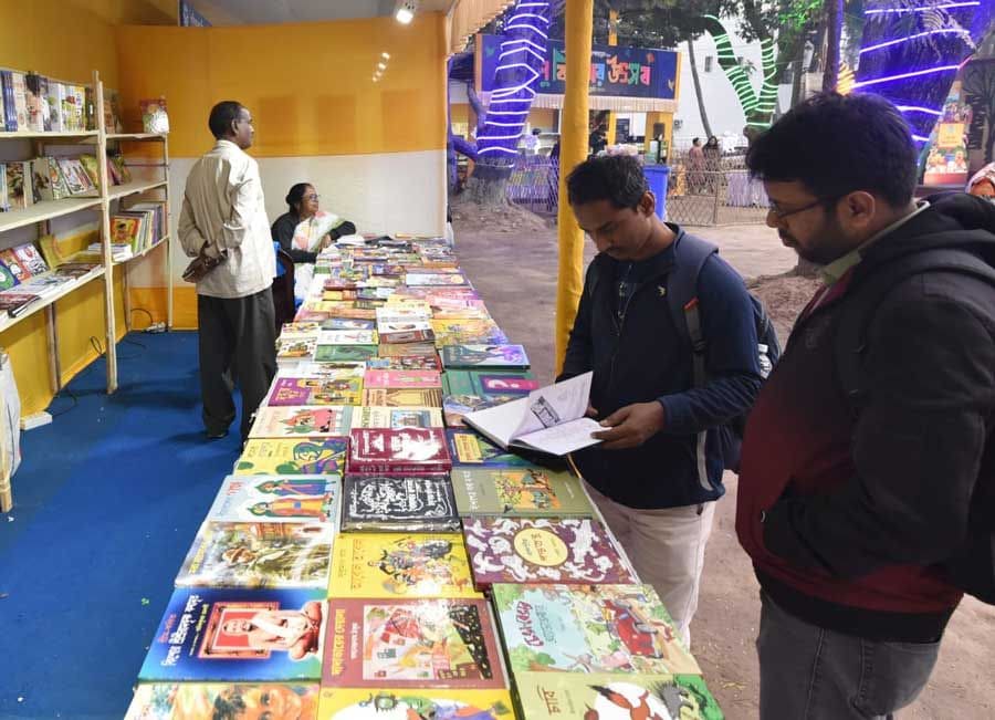 Visitors check out books at Sishu Kishor Utsav at Ektara Mukta Mancha, Rabindra Sadan. The event began on January 17 and will continue till January 22 