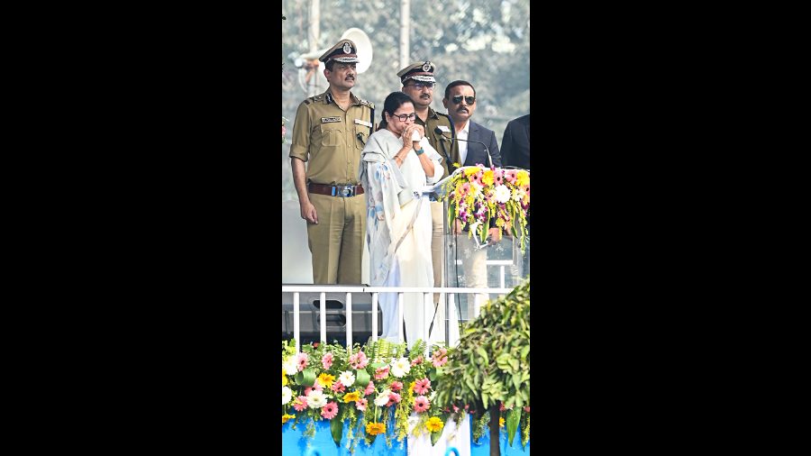 Mamata Banerjee blows a conch during the birth anniversary event of Netaji Subhas Chandra Bose in Calcutta on Monday