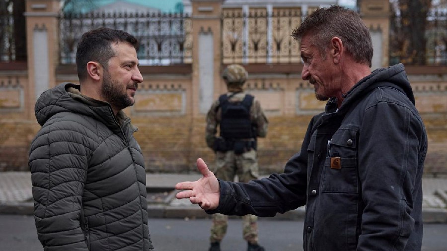 President, Volodymyr Zelenskyy, left talks with American Oscar winning actor Sean Penn in Kyiv