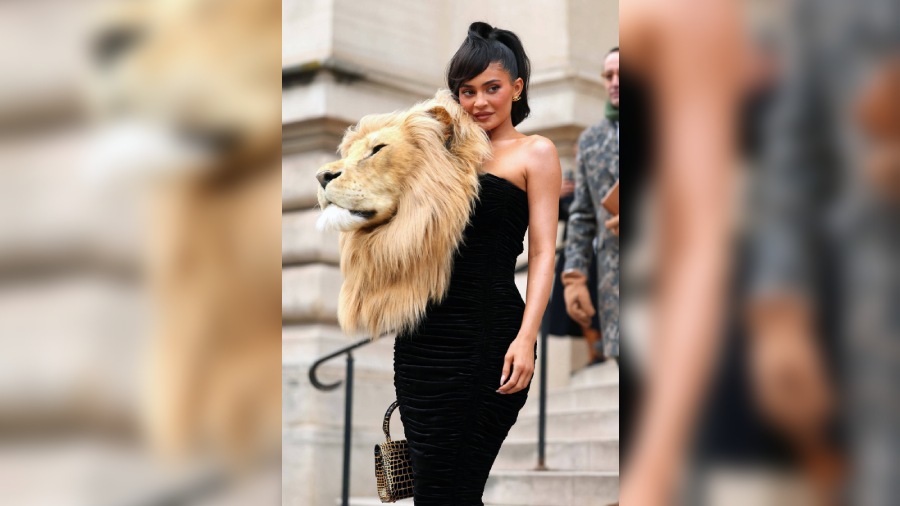 Kylie Jenner pose with her unique lion head gown at the Paris Fashion Week 2023. 