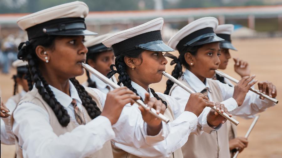 Students take part in the full dress rehearsal of the Republic Day parade at Manek Shaw Parade ground in Bangalore.