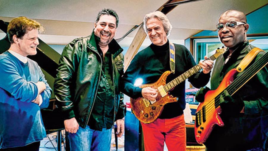 Barot alongside John McLaughlin (third from left) as part of 4th Dimension