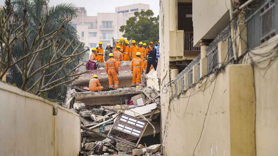 Rescue operation underway after the collapse of a four-storey residential building in the Hazratganj area, in Lucknow