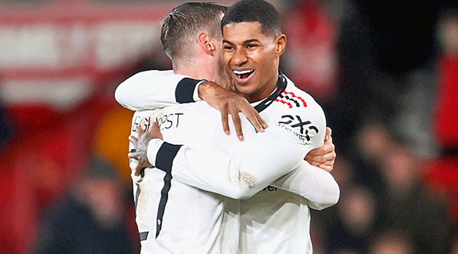 Wout Weghorst (left) celebrates with Marcus Rashford after scoring Manchester United’s second goal against Nottingham Forest on Wednesday.
