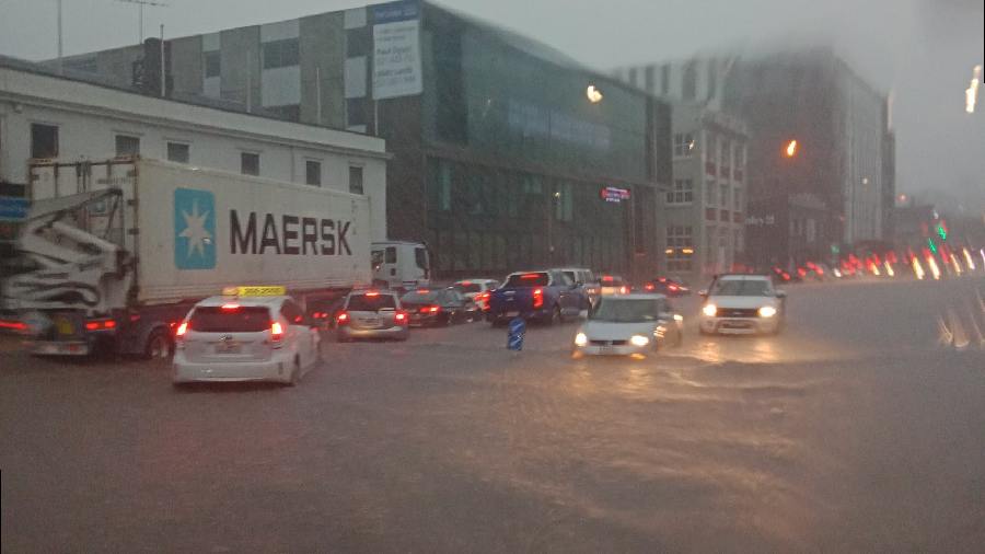 The flash floods have caused hazardous driving conditions, cars are stuck in the water.  It has caused major disruptions to traffic. Rain that wreaked havoc caused misery to commuters onboard on an Auckland bus after floodwater inundated the vehicle.Transport authorities closed parts of State Highway 1, the main highway that runs through the city.