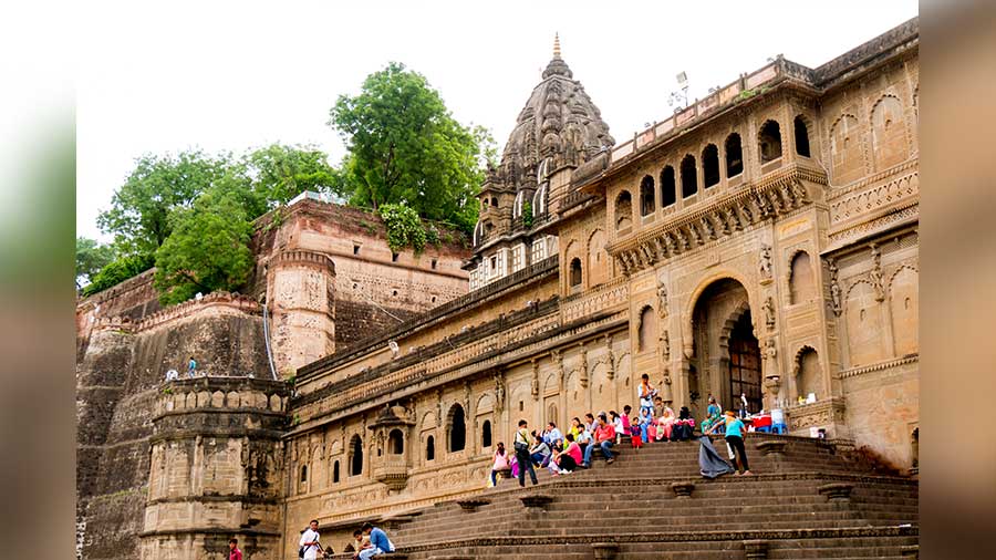 Tourists and locals on the ghat steps