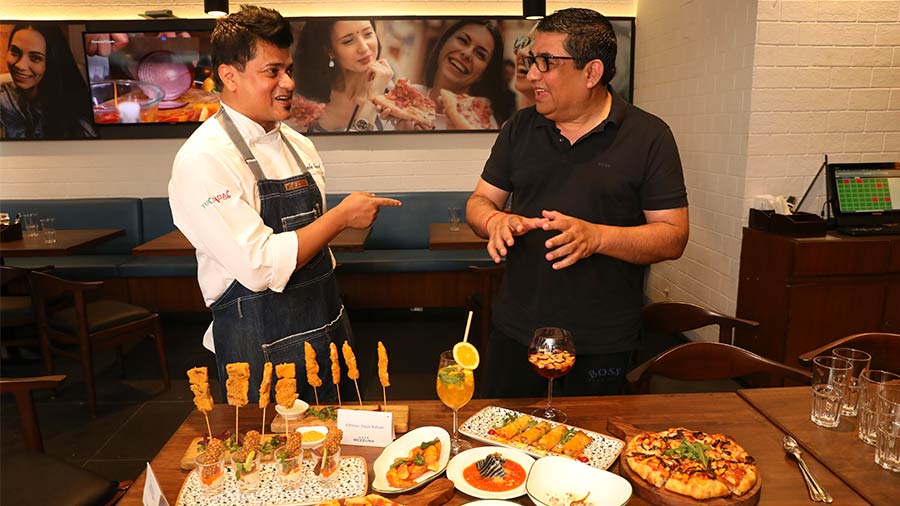 Chef Sabyasachi Gorai and Anjan Chatterjee share a laugh