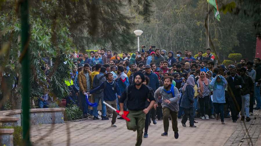 Members of Bhim Army Student Federation gather for screening of the BBC documentary film ‘India: The Modi Question’, at Delhi University Arts Faculty, in New Delhi, Friday, January 27, 2023.