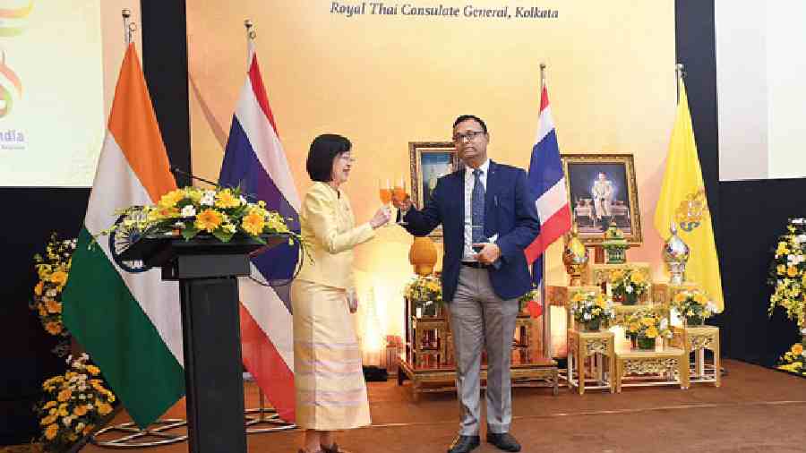 Consul general Acharapan Yavaprapas raises a toast with the chief guest, tourism secretary Soumitra Mohan, at the Thai national day reception at The Park