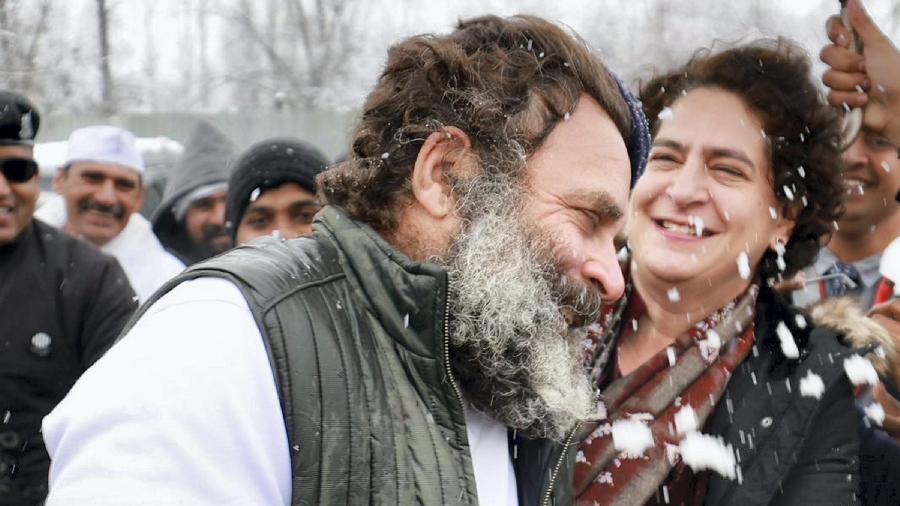 Rahul Gandhi and Priyanka Gandhi play with snow at the yatra camp site in Srinagar. 