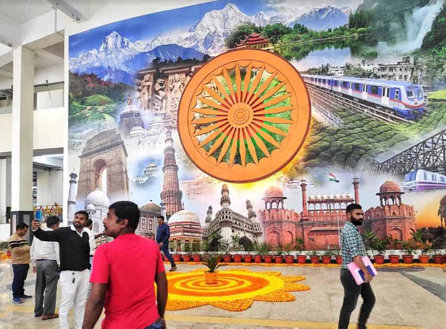 People click selfies outside the decked up Kavi Subhash Metro Station. The giant poster in the background reflects the Metro connectivity throughout the country