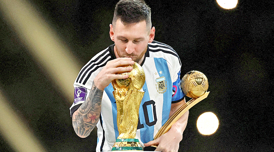 Lionel Messi kissing the World Cup on December 18.