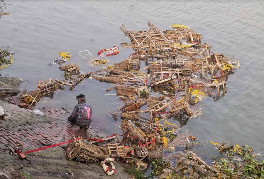 Hooghly river awoke in a sorry state the morning after Saraswati Puja, as the river was littered with flowers and waste materials due to immersions