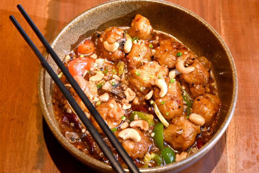 Kai Phad Med Mamuang is chicken chunks wok-fried with cashew nuts, fresh mushrooms andsun-dried chilli in soya and oyster sauce. Rs 499