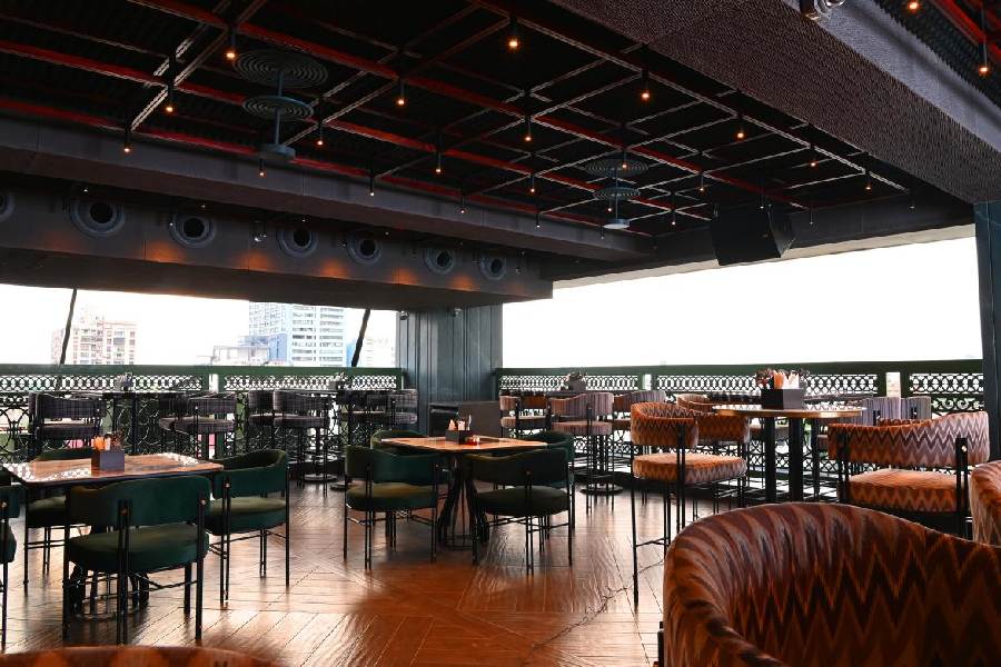 The outer area is carefully planned keeping the Calcutta weather in mind. It has a covered roof but is open on the sides for a panoramic city view of the city. There is an air-conditioned indoor space that will be more comfortable in summer with the blinds drawn down. The area has its own bar as well.