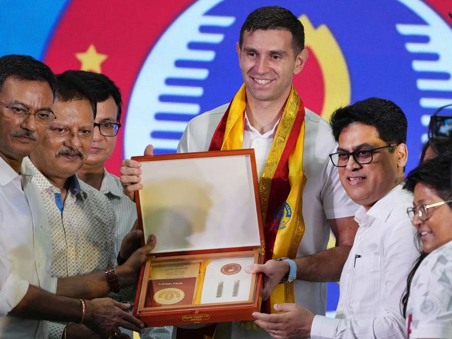 FIFA World Cup 2022 winning team member Argentinian Emiliano Martinez was presented the lifetime membership of East Bengal FC by the club's officials during the 'Tahader Kotha' event in Kolkata on Tuesday  