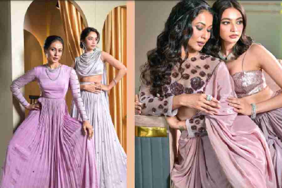 (l-r) Diti and Ushoshi both channel understated glam in these flowy looks. Diti in a steel-blue skirt + bralette + dupatta, and, Ushoshi in a lavender gown with stone detailing,  Shimmer and shine is the mood here with Ushoshi’s dhoti sari + tulle blouse and Diti’s subtle georgette silk-based skirt + sequinned bralette look.