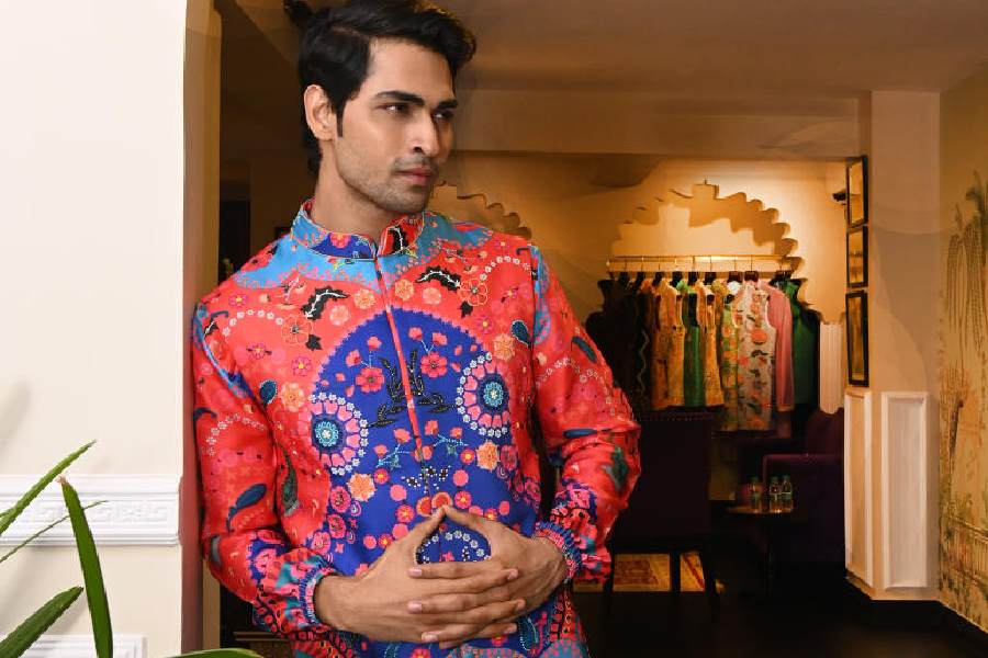 The print-on-print ensemble is comfortable, hassle-free and cool. The vibrancy of the set matches the celebratory mood.
