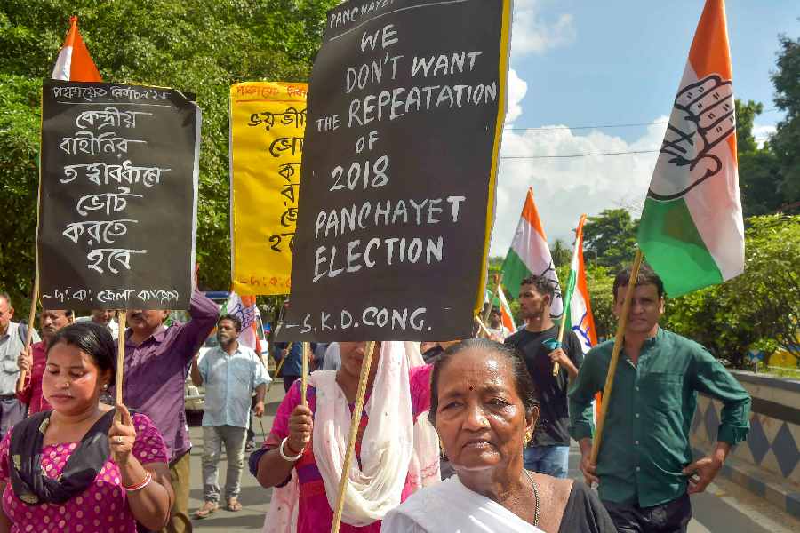 West Bengal Congress supporters take part in a protest demanding violence free panchayat polls, in Calcutta.
