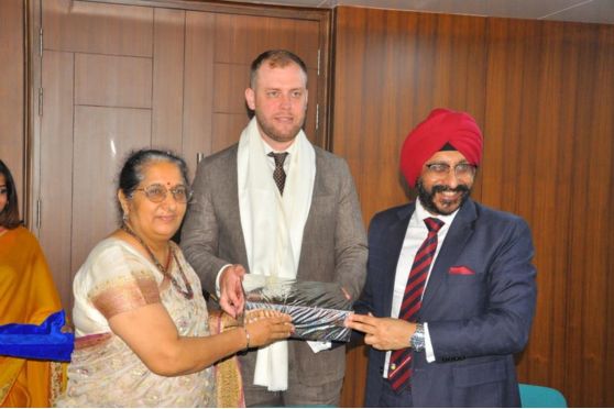 Dr Stanislav Surovtsev, Vice-Rector for Students' Development and International Relations, MGIMO University felicitated by Dr Balvinder Shukla and Dr Gurinder Singh.