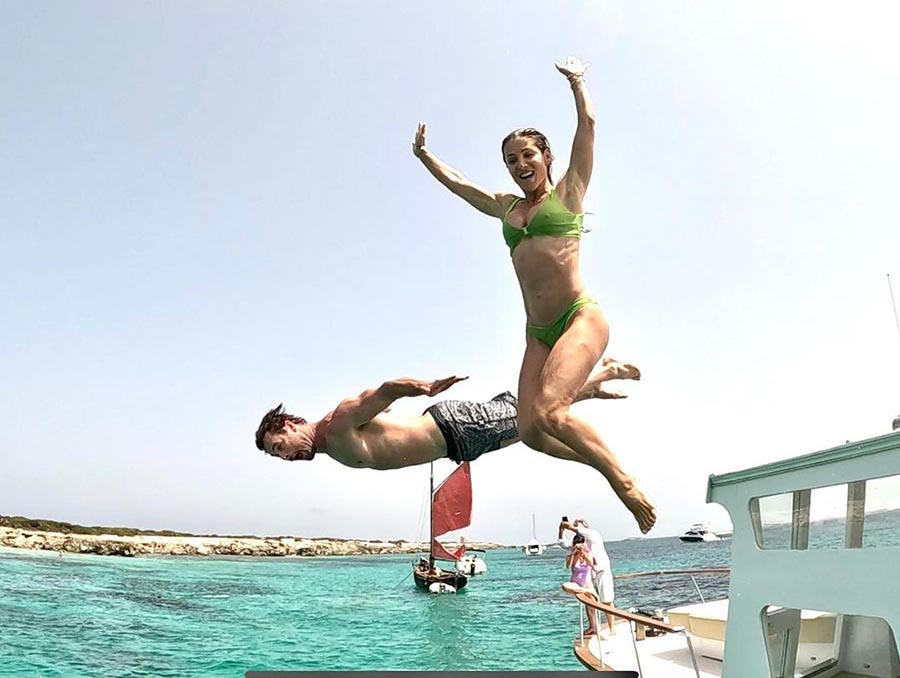 Chris and Elsa looked excited as they dived into the Mediterranean Sea.