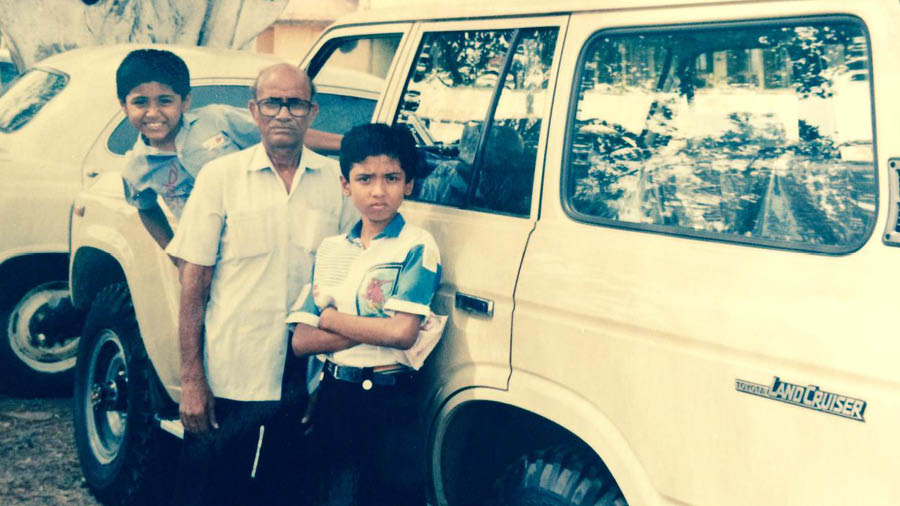 A young Debaditya and Shiladitya with their father’s Toyota Land Cruiser – which stoked his fascination for cars