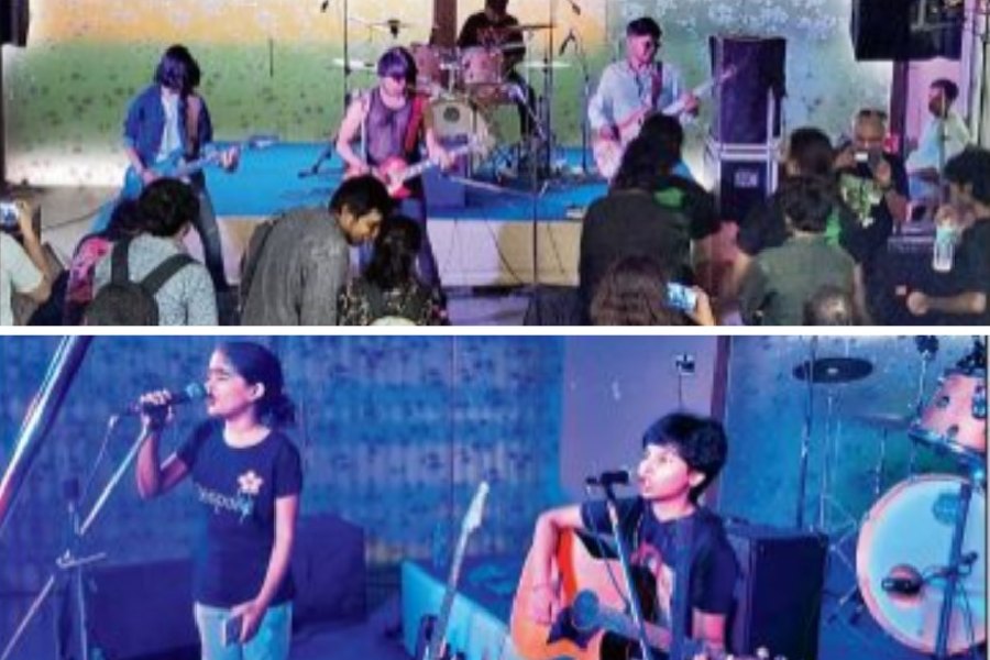 A band plays to the AC Block gallery; (below) The youngest performers Dynamic Duo on song