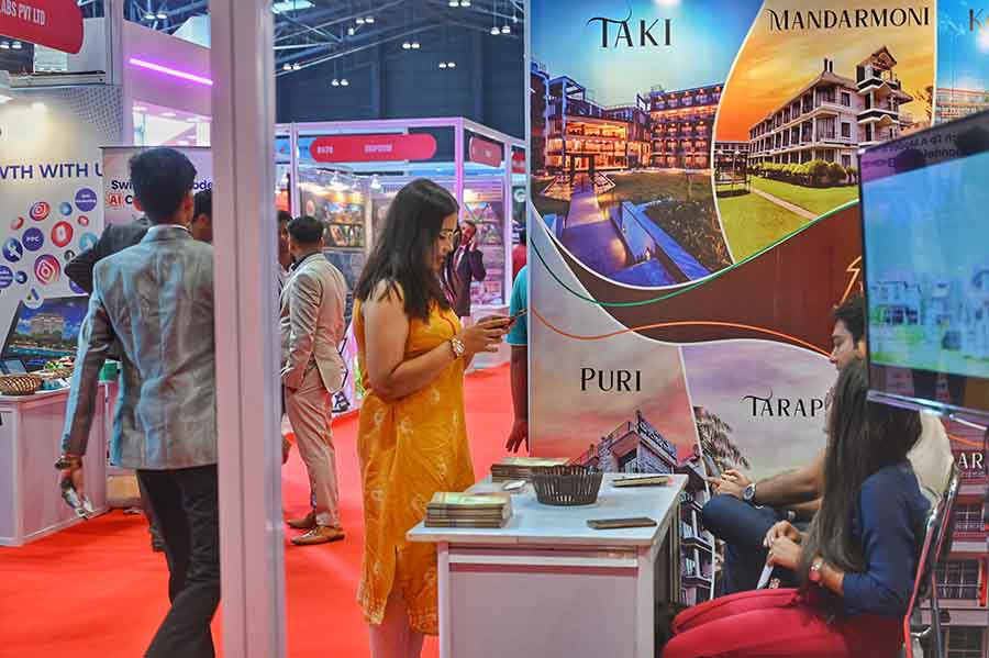 A young visitor checks out the latest travel brochures on quick getaways from Kolkata at a stall at the fair. The fair will be open to visitors from 2pm on Friday, up to 7pm. Sunday is the final day of the fair, and it will be open to the public from 11am to 7pm