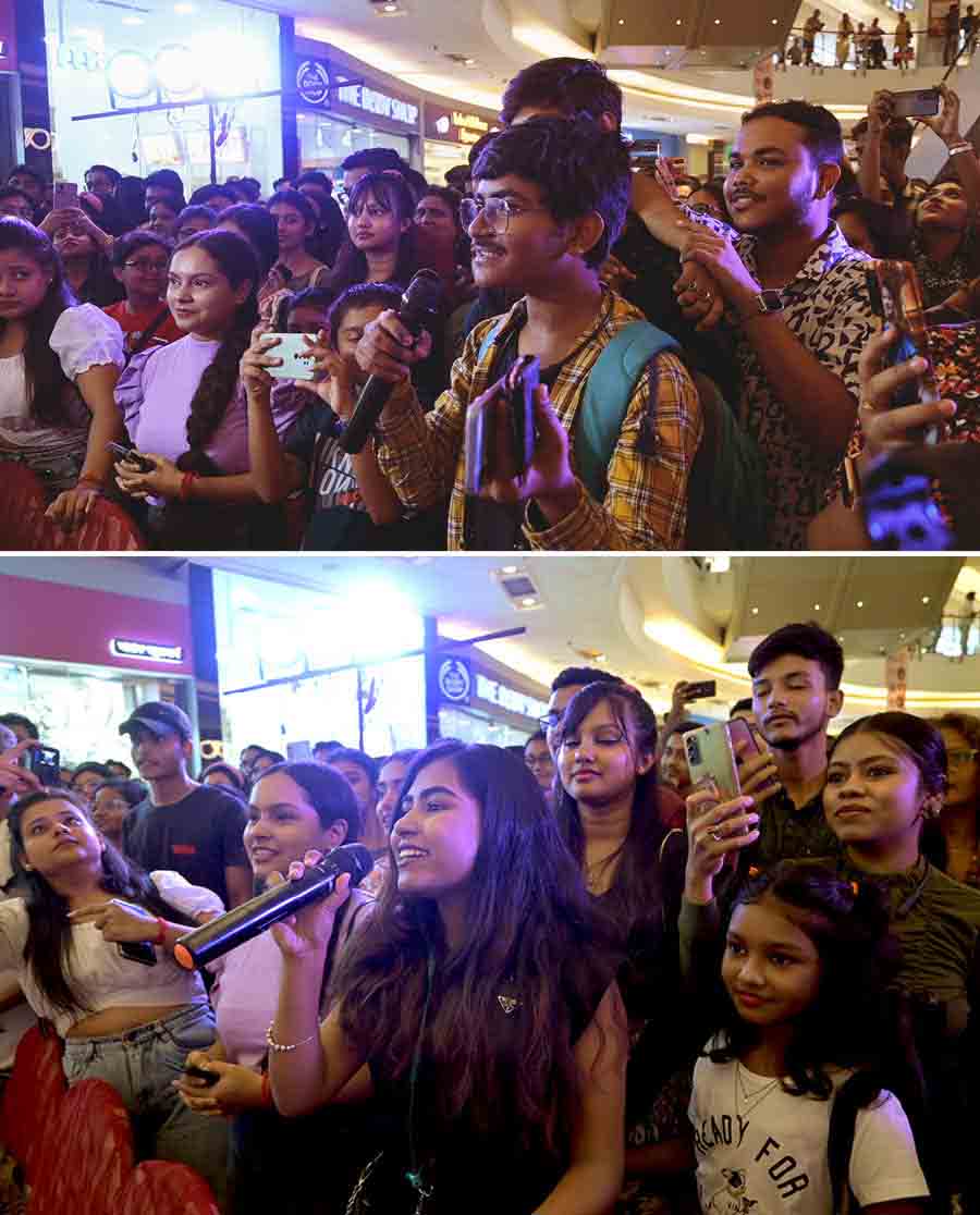 The huge turnout at Mani Square had people on all the other floors, eager to catch a glimpse of Ankita and Antara Nandy. The six-to-sixty fans in front of the stage threw their hands up in the air to participate in the music quiz, grooved and lent their voices with the sisters without missing a beat. The first among the few fans, who got the songs right, was Ratul Singha, who also drew a mandala with Veena for the sisters. Ankita, a fan, stole the hearts of the sister by singing ‘Tapa Tini’ in perfect tune