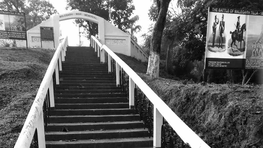 The steps leading up to the Malegarh War Memorial, now part of Karimganj, Assam