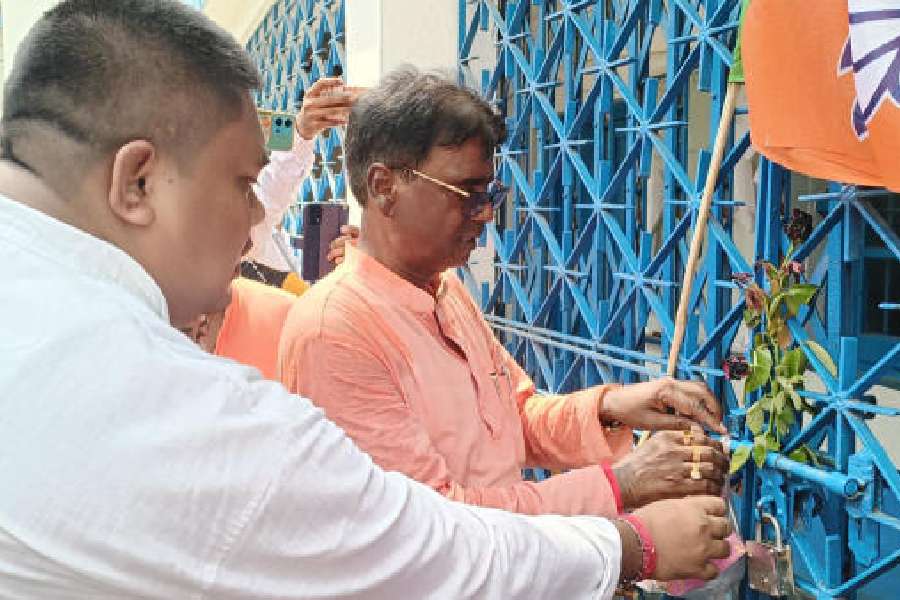 BJP MP Khagen Murmu at the entrance to the BDO office in Gazole on Tuesday
