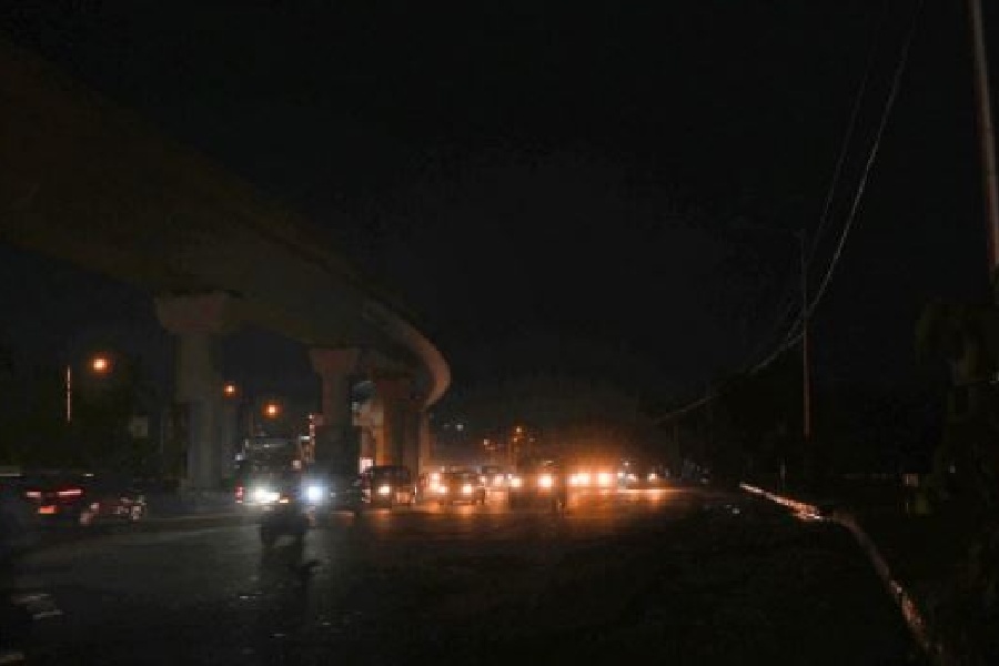 A stretch on EM Bypass, between Tagore Park and Uttar Panchannagram, without street lights on Monday evening. 