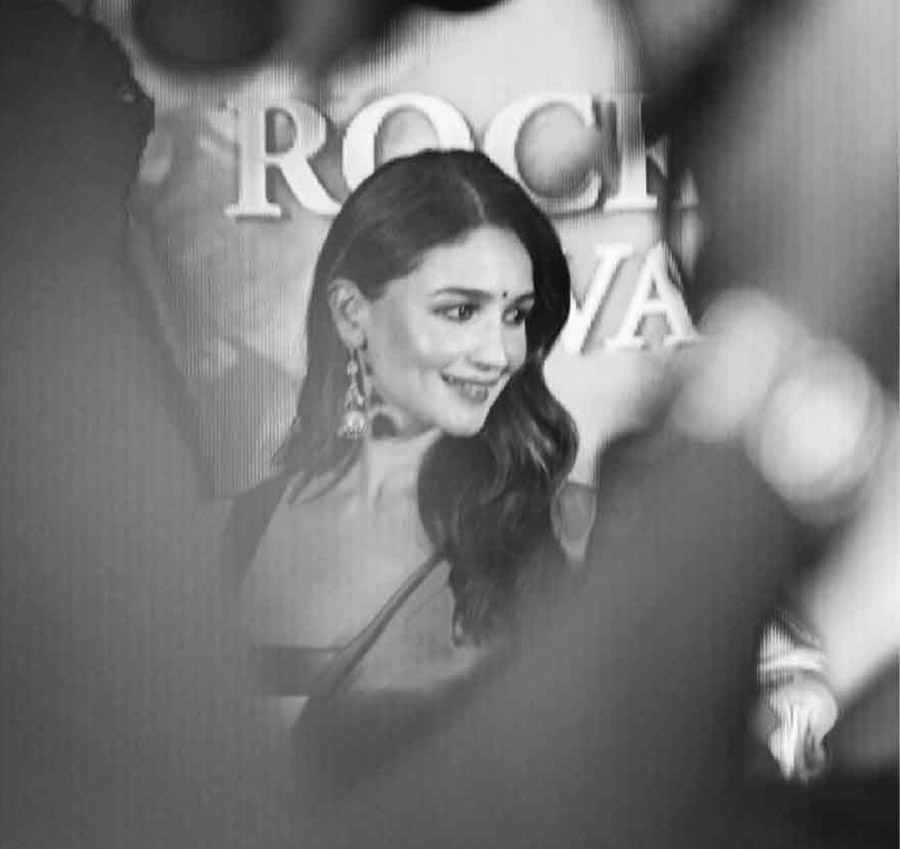Alia also shared a monochrome candid photo of herself from the event. 