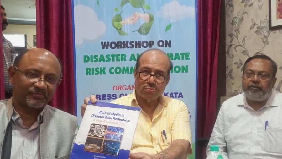 Disaster Management minister Javed Khan flanked by Rajib Shaw (on his right) from Keio University, Japan, and Snehasis Sur, president, Kolkata Press Club