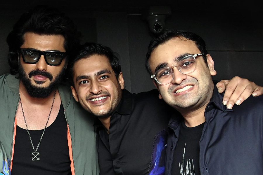 Happy faces for the night were Tanay Agarwal (right) and Ayush Killa (centre), Calcutta partners for the brand, as they posed with Arjun Kapoor celebrating he launch of their latest venture