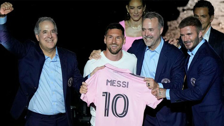 Lionel Messi with Jorge and Jose Mas and David Beckham, owners of Inter Miami, at his formal unveiling for the club on July 16
