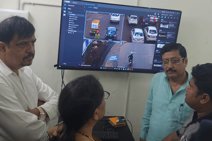 A Webel Technology official displays the CCTV functioning in the control room at Bidhannagar East police station on Monday.