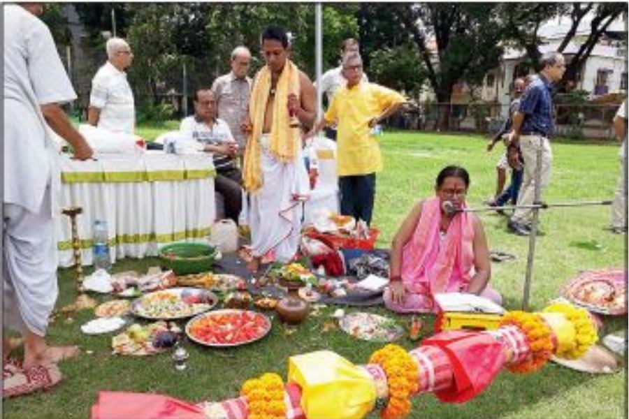 The priest chants mantras during BB Block’s khuti puja