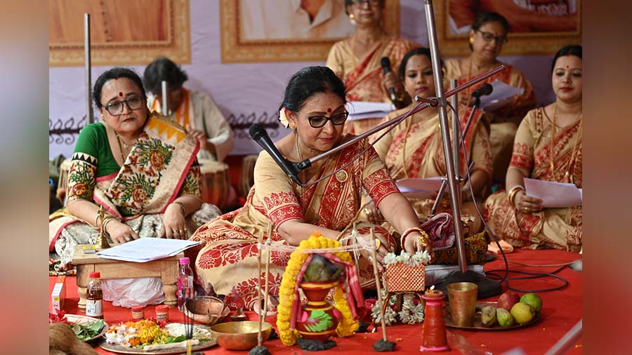 Nandini Bhowmik performs 'khunti' puja at the 66 Palli pandal on July 16