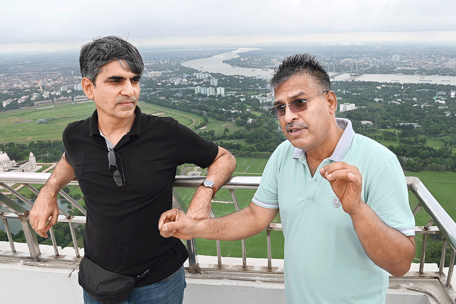Lt Col Satyendra Verma (retd) and (right) Group Captain Kamal Singh Oberh (retd) on the roof of The 42 on Saturday.