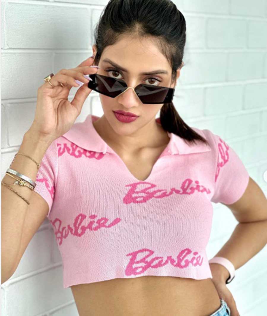 Nussrat Jahan: “I’m the Barbie u can’t play with 😉” is her vibe check, as she gives a “look” too. Meanwhile, we are totally fanning ourselves and looking for a similar tee. The whole avatar plus that crop tee that says Barbie is so fetch that we simply cannot not have this in our wardrobe