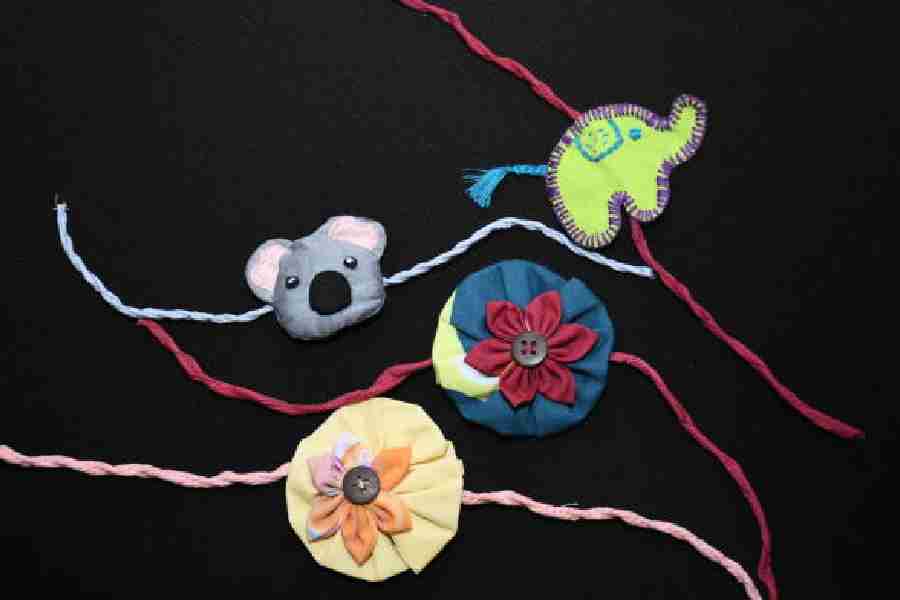 These adorable rakhis are made from leftover fabric that are sent to an NGO that works with women artisans. They handmake them with different shapes that match prints that they have in their bedding set and loungewear. Rs 349 @ Masaya