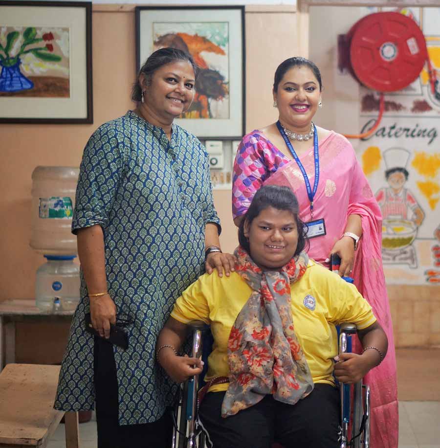 Srija Sinha (centre), was awarded for general proficiency and was also one of the recipients of the School Leavers Awards which are meant for students who, after turning 18, graduate from the school services and move on to the other departments of IICP.  Srija was at her chirpy best and agreed for a photograph with her mother (left) and principal of the Centre for Special Education, IICP unit, Suchetana Mukherjee (right). Her mother, Sriparna Mitra Sinha said that IICP had been an integral part of their lives ever since Srija was two years old. ‘I am always grateful to IICP for making my daughter into a well-rounded, independent woman. I would love for more parents to come here and seek help because there are many parents who are still in denial about the condition,’ she said