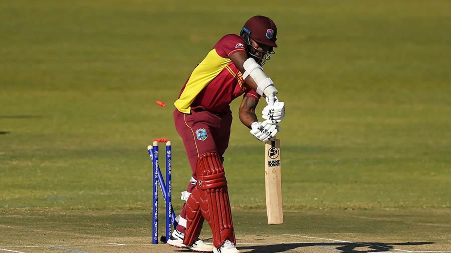 Kyle Mayers of West Indies is bowled by Chris Sole of Scotland during the ICC Men's Cricket World Cup Qualifiers 